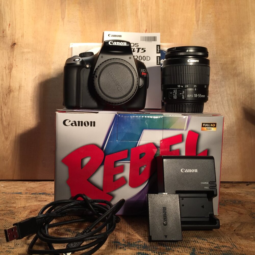 Canon Rebel T7 DSLR Camera Bundle w/ 18-55mm lens, Strap, & batt/charger
